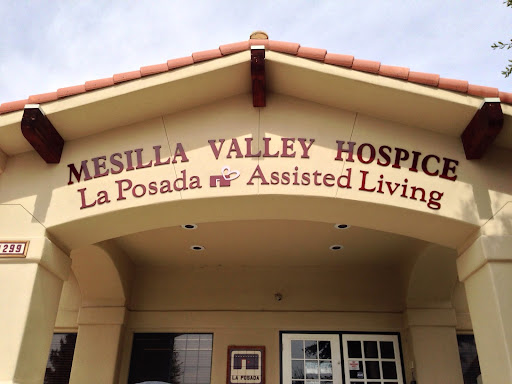Entrance signage of Mesilla Valley Hospice and La Posada Assisted Living.