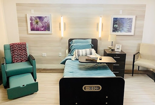 A cozy and inviting hospital room designed for patient comfort.