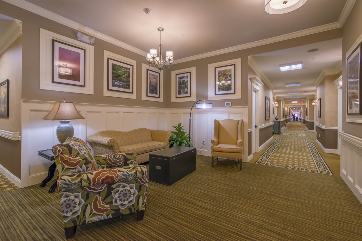 A cozy lobby area with seating and decorative elements.