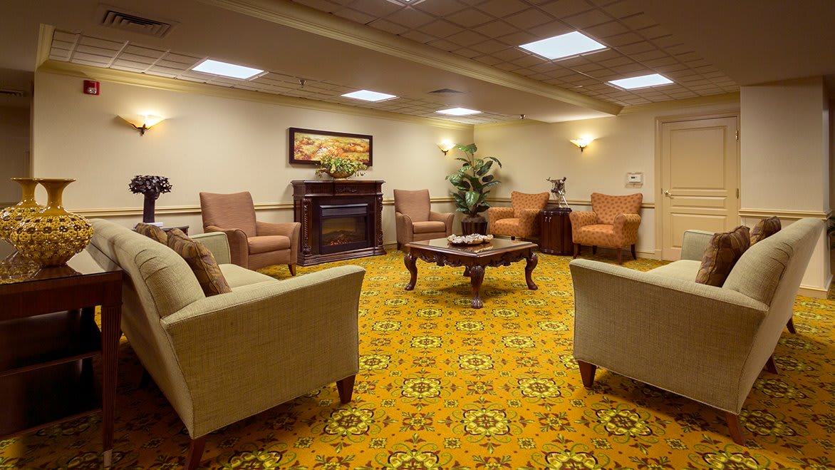 A cozy lobby area with comfortable seating and warm lighting.