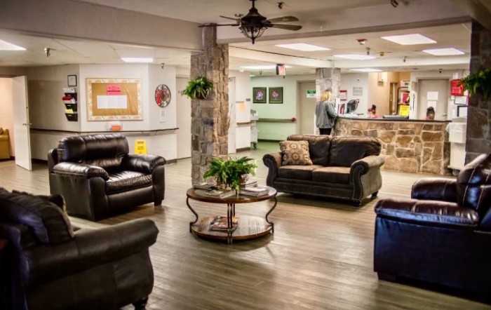 A cozy lobby with comfortable seating and a welcoming reception desk.