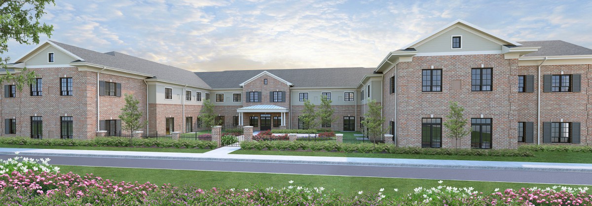 A modern two-story residential building with landscaped surroundings.