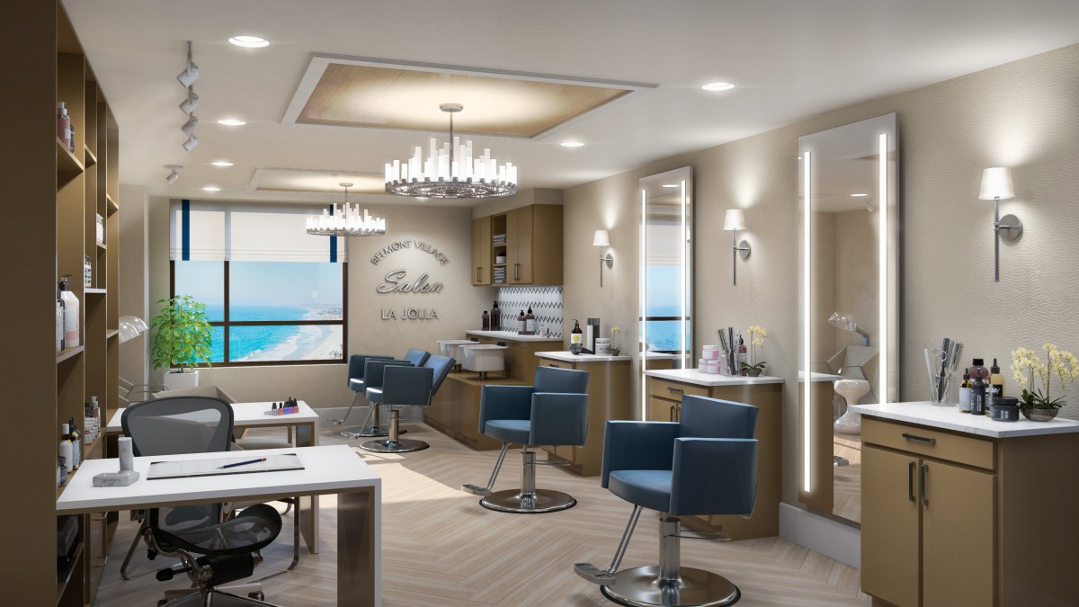 A modern and elegant salon with an ocean view, featuring stylish chairs and mirrors.
