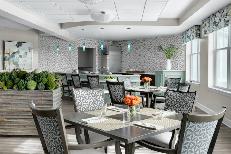 A modern dining area with elegant decor and neatly arranged tables.