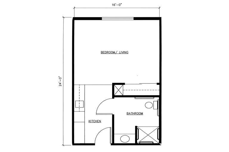 A floor plan of a studio apartment featuring a kitchen, bathroom, and a combined bedroom/living area.