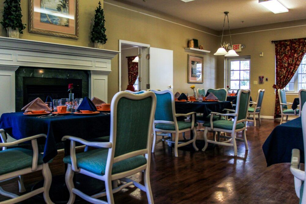 A cozy dining room with elegant furniture and warm lighting.