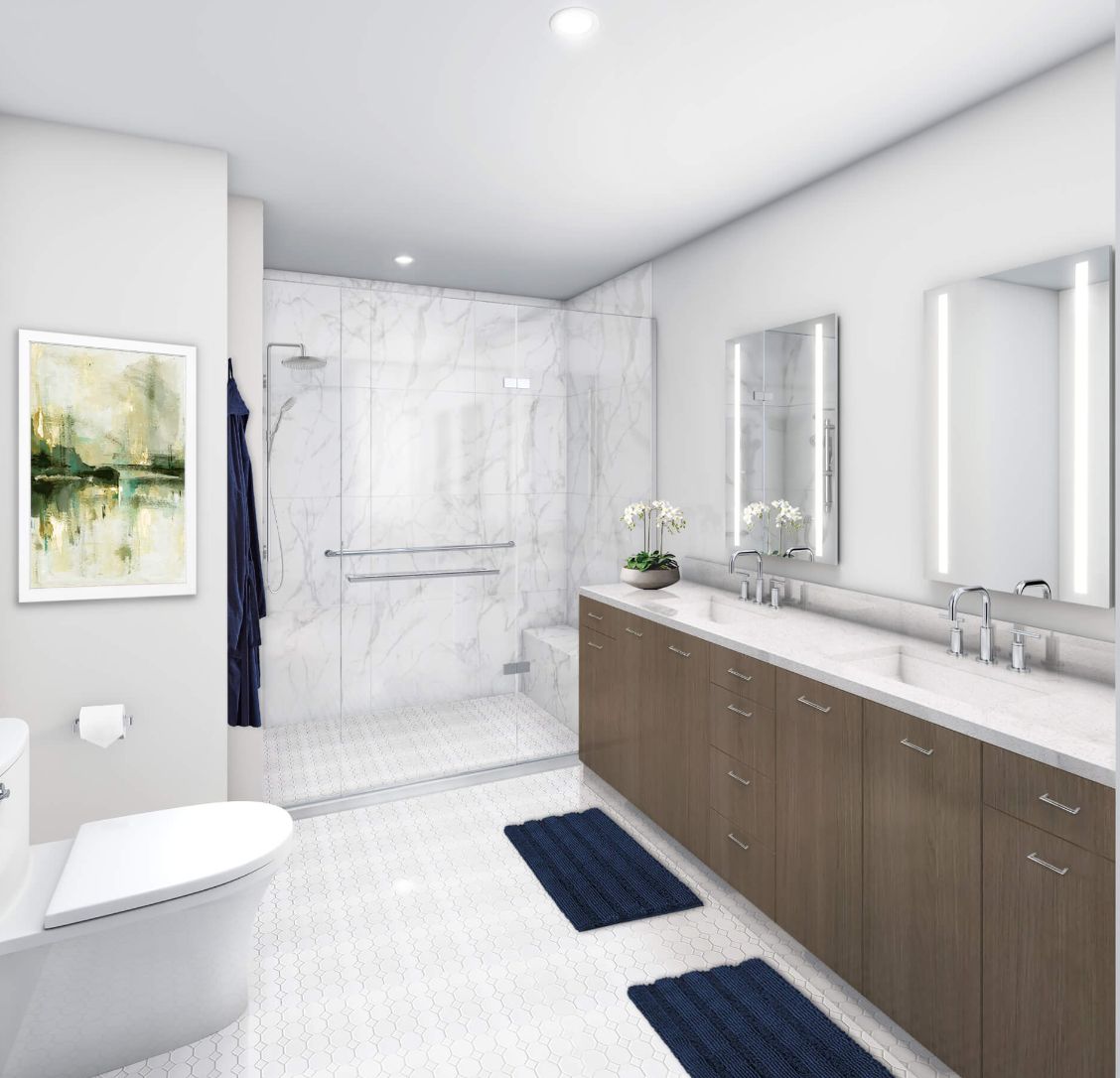A modern bathroom with a double vanity, marble tile shower, and minimalist decor.