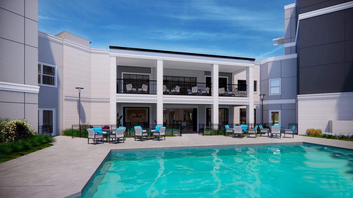 A modern residential building with a pool and outdoor seating area.