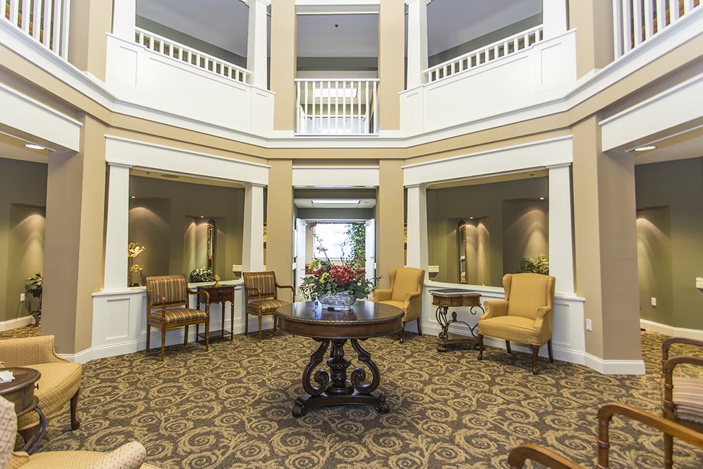 A well-appointed lobby featuring elegant furniture and sophisticated architectural design.