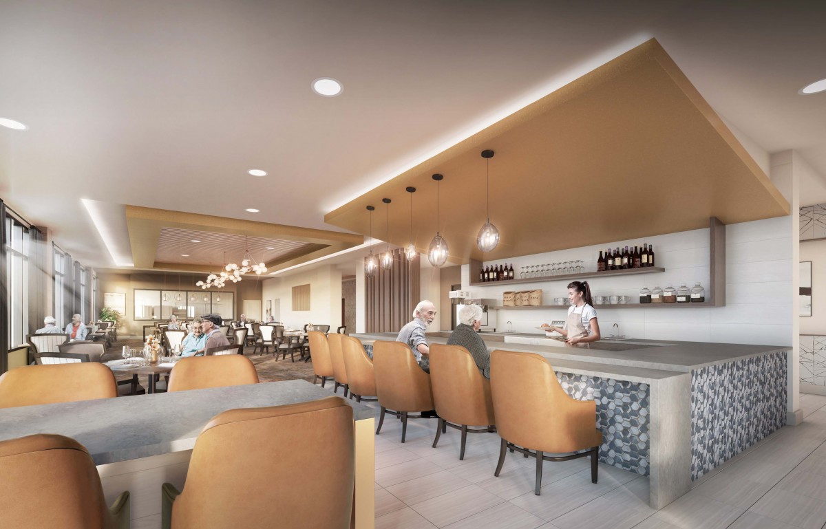 A modern restaurant interior featuring a bar with stylish seating and ambient lighting.