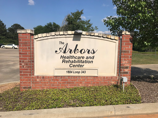 Sign for the Arkos Healthcare and Rehabilitation Center.