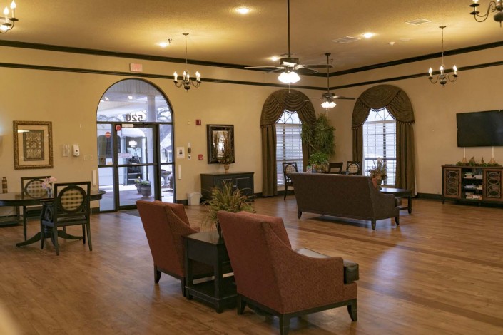 A cozy and elegant lobby with comfortable seating and warm lighting.