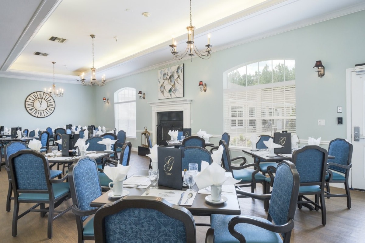 An elegant dining area with beautifully set tables and stylish decor.