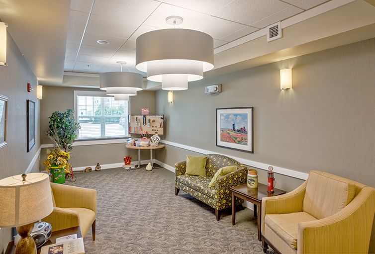 A cozy and well-decorated lobby with comfortable seating and modern lighting.