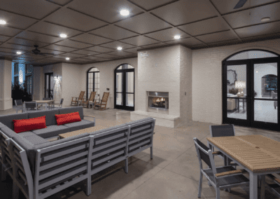Modern living room with a fireplace and contemporary furniture.