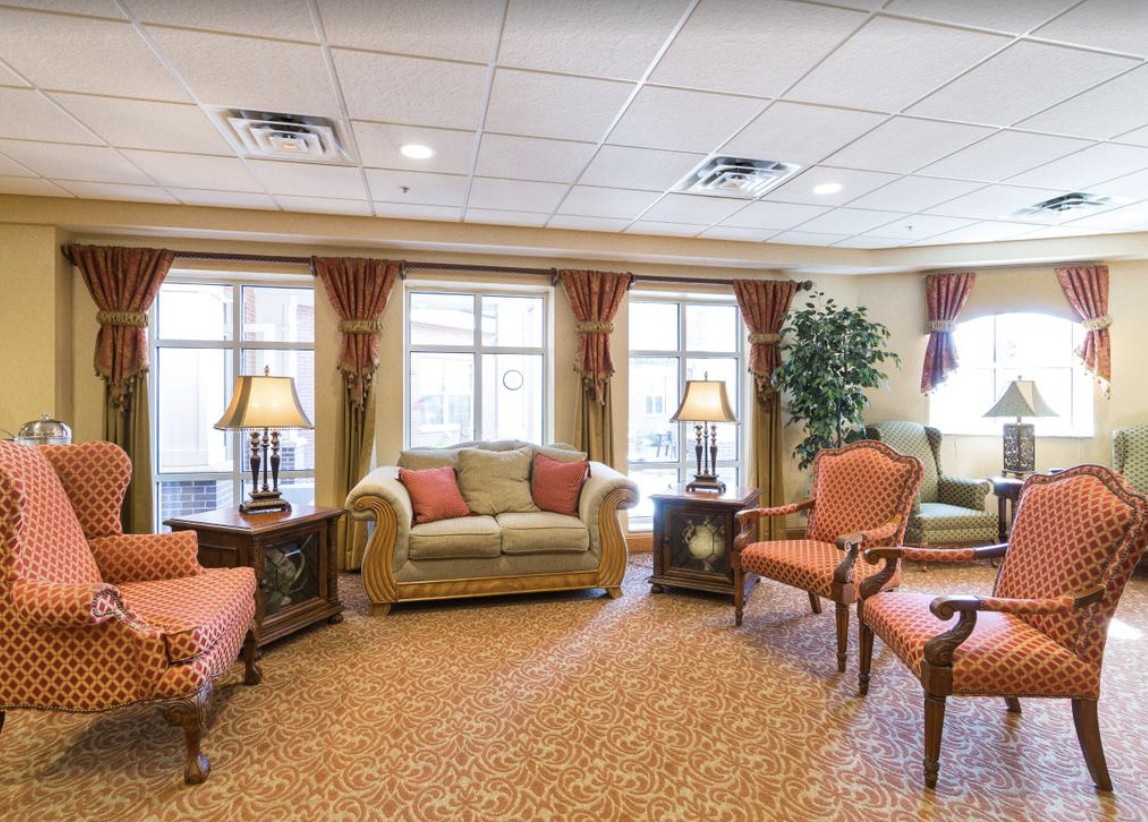 A cozy living room with comfortable seating and warm decor.