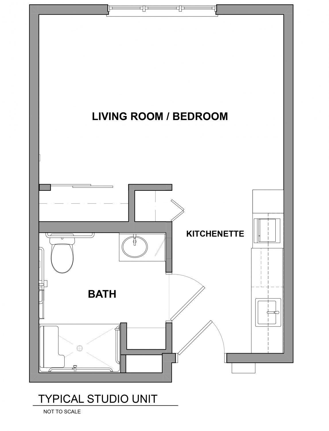 A floor plan of a studio apartment with a combined living room and bedroom, a kitchenette, and a bathroom.
