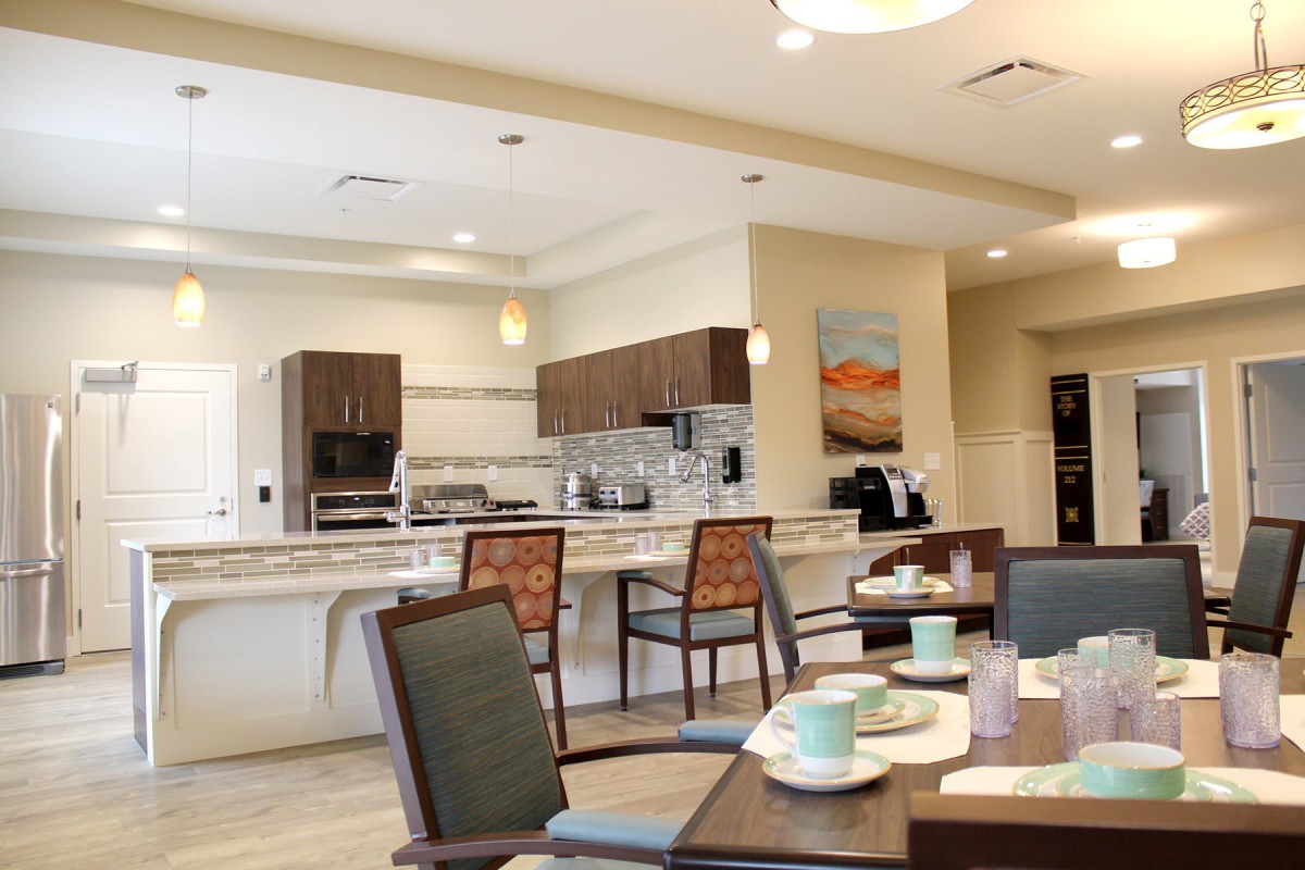 A modern open-concept kitchen and dining area with stylish furnishings.