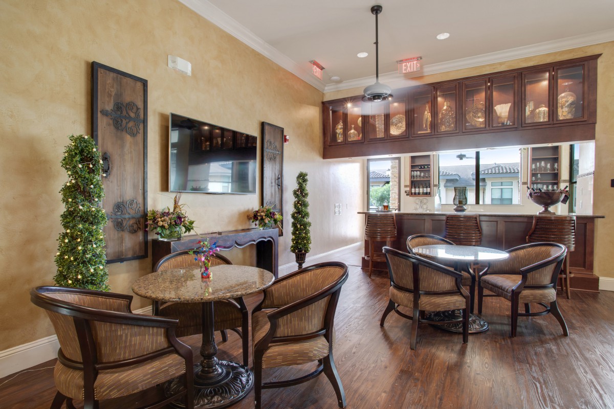 A cozy living room with elegant wooden furniture and decor.