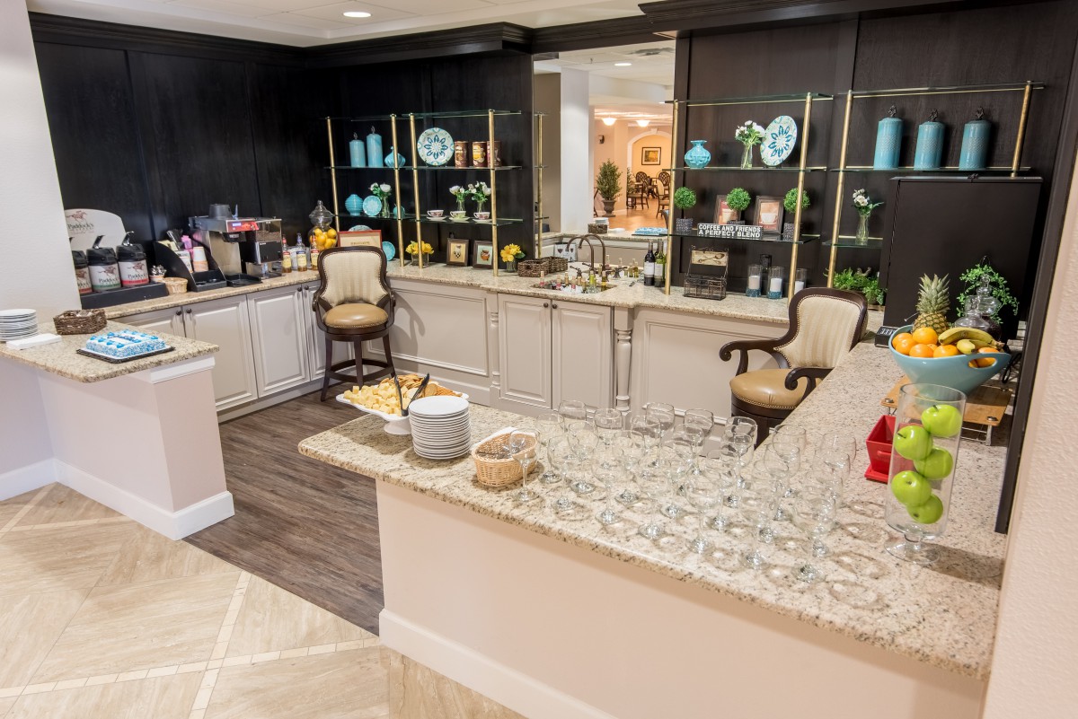A stylish boutique interior with shelves displaying decorative items and a welcoming counter area.