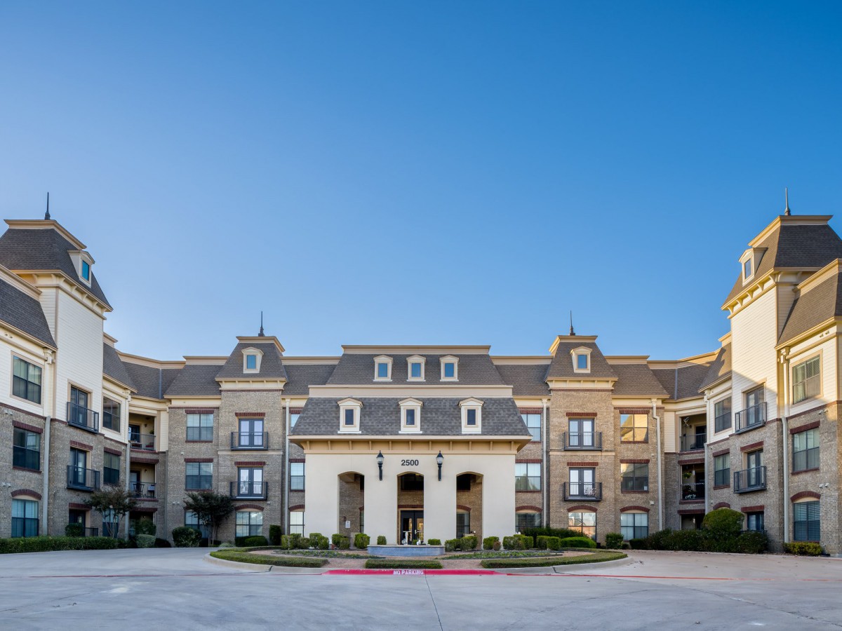 A luxurious residential apartment building with elegant architecture.