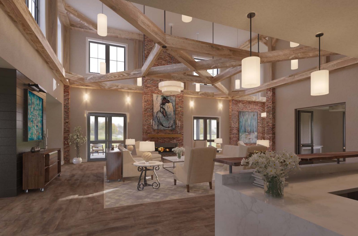 A modern living room with exposed wood beams, brick walls, and elegant chandeliers.