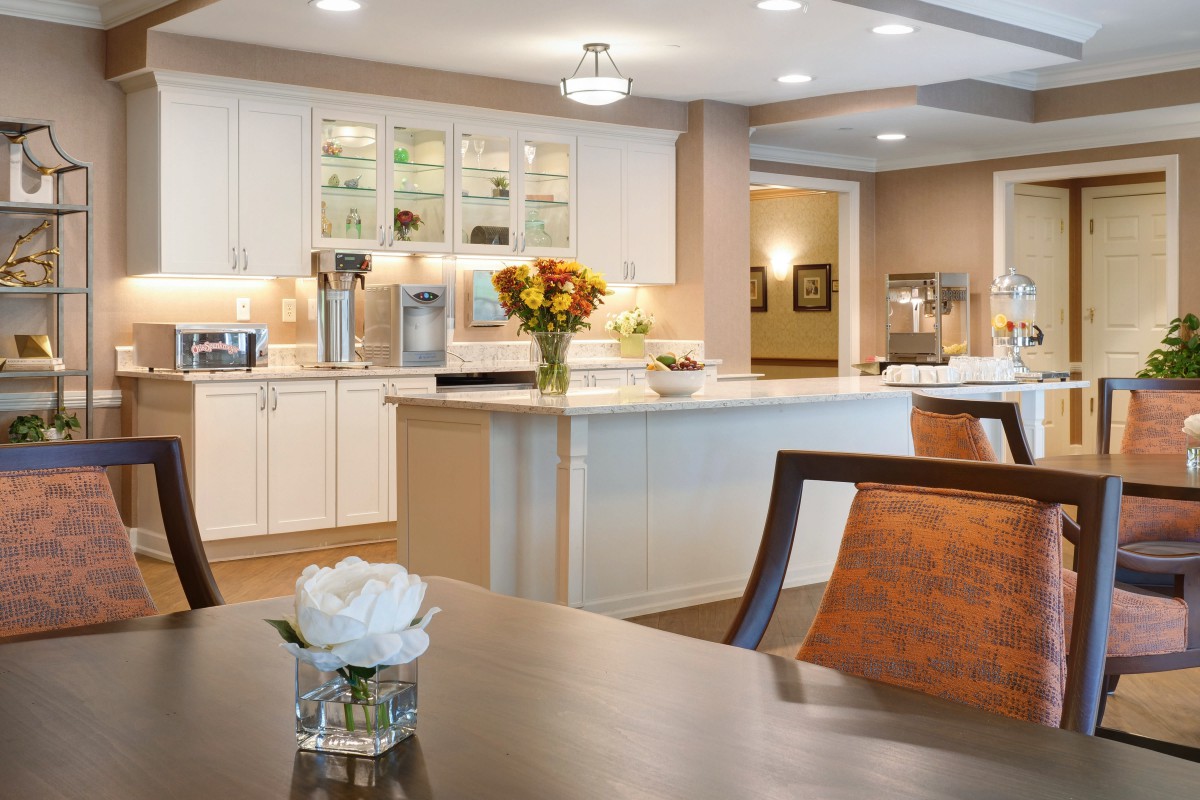 A modern kitchen and dining area with elegant decor.