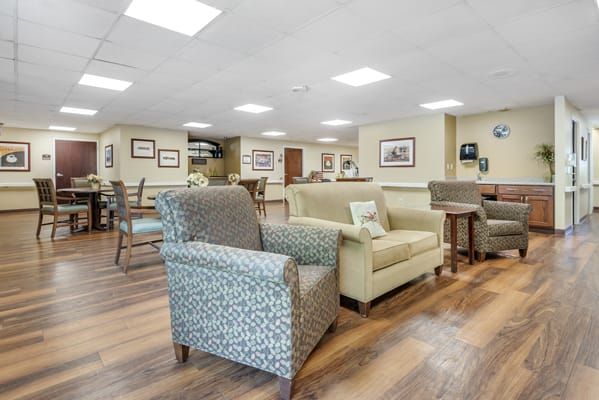 A cozy living room with comfortable seating and modern decor.
