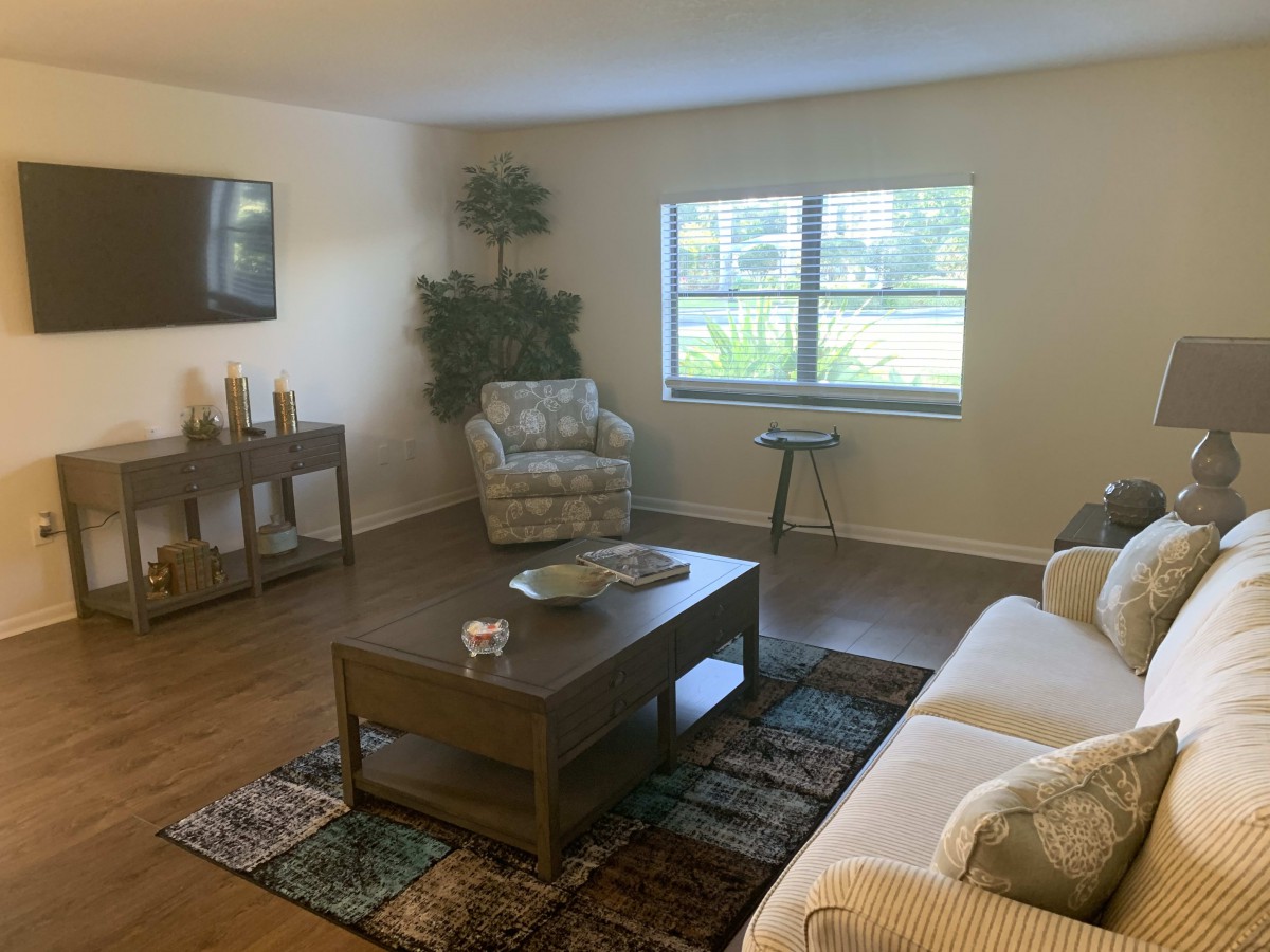 A cozy living room with comfortable seating and tasteful decor.