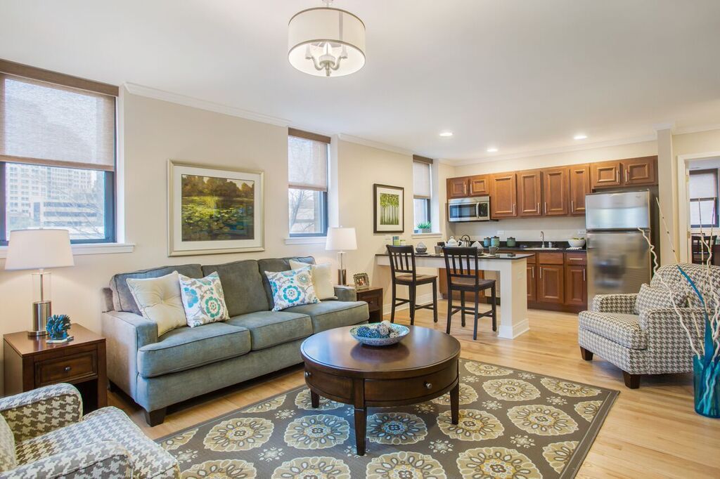 A cozy open-plan living and kitchen area with stylish decor.