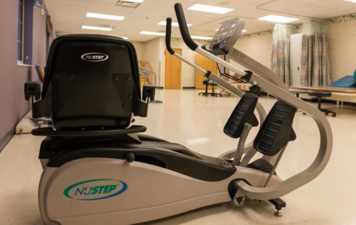 A recumbent cross trainer in a fitness facility.