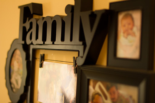 A cozy display of family memories framed on a wall.
