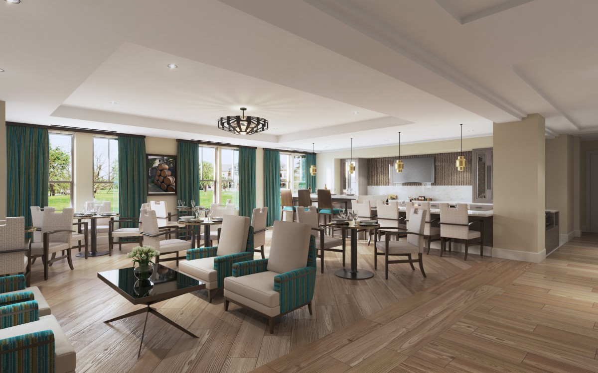 A spacious, elegantly designed open-plan living area with modern furniture and a kitchen.