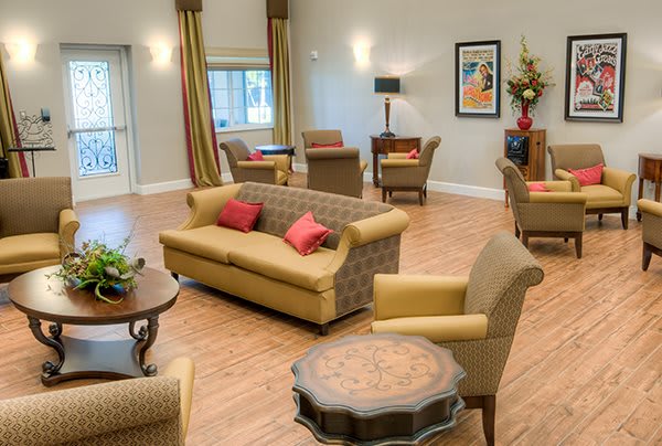 A cozy living room with comfortable seating and elegant decor.
