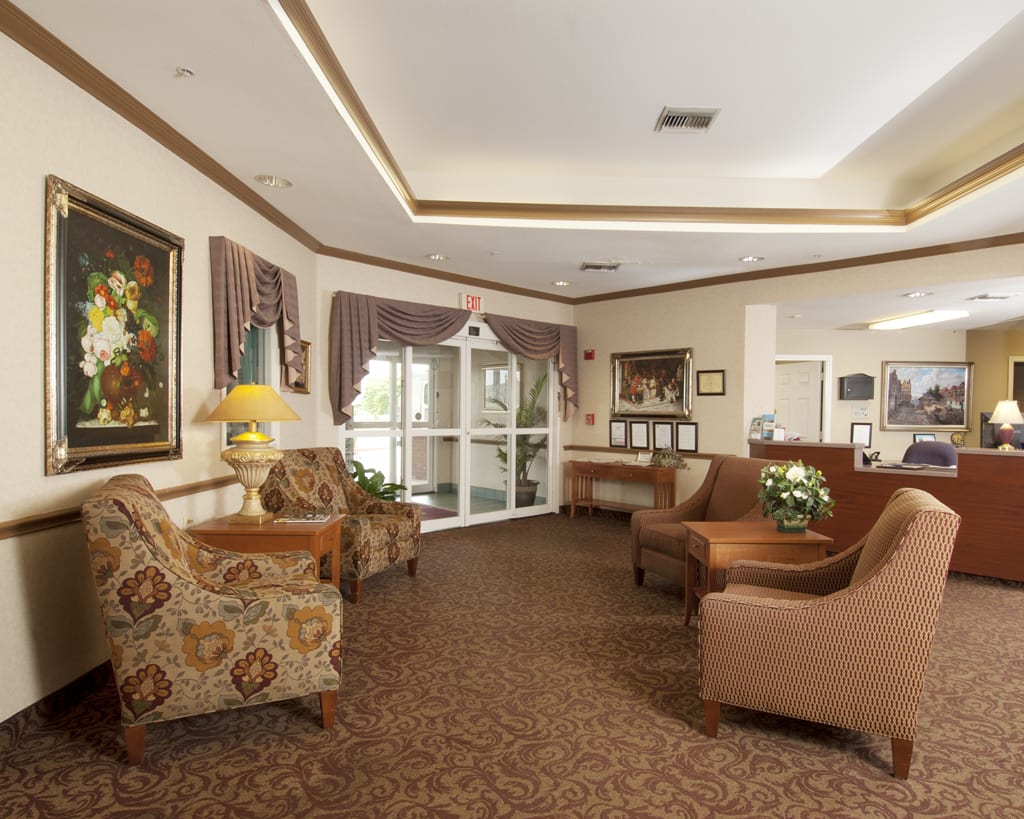 A cozy lobby area with comfortable seating and elegant decor.
