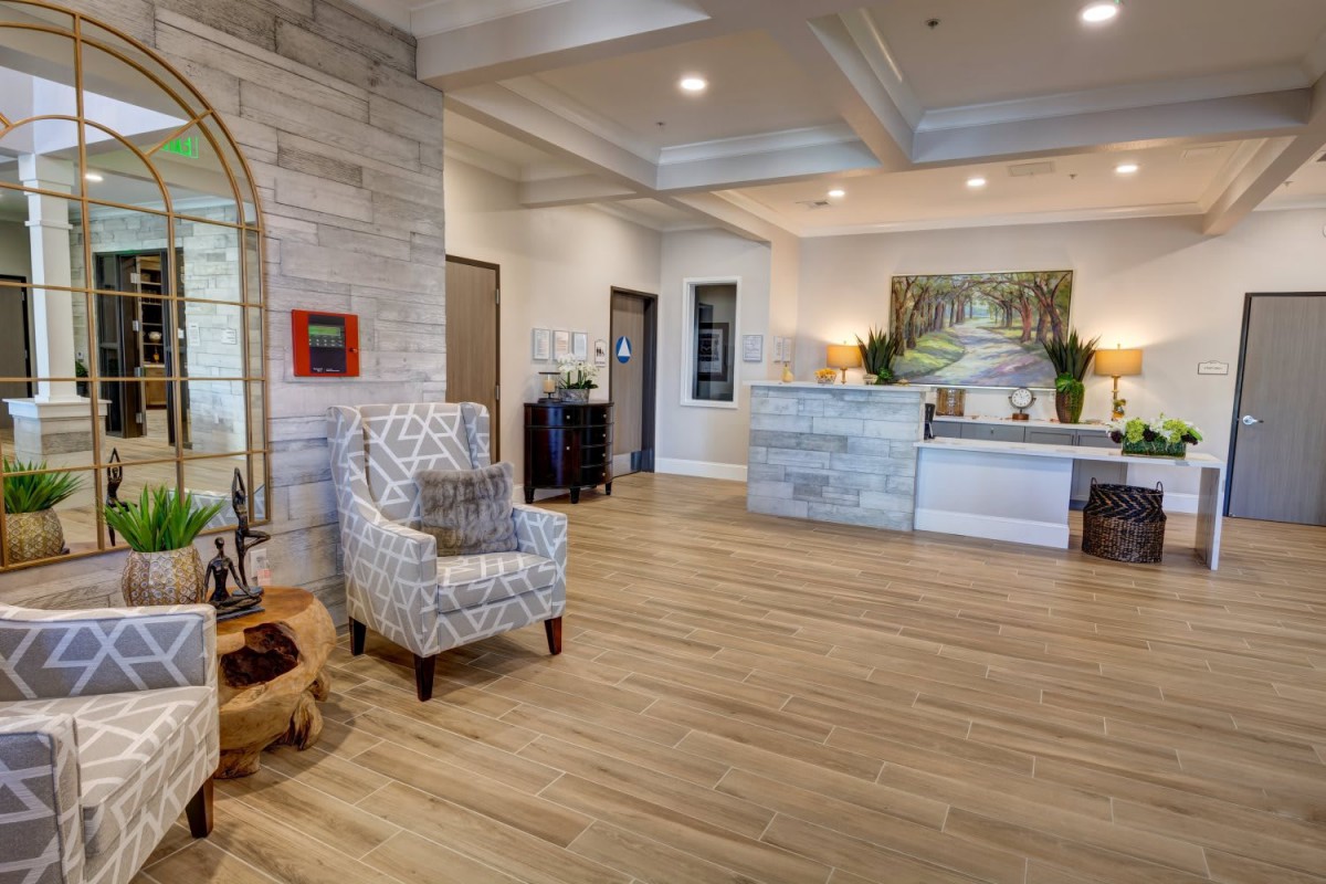 A modern reception area with stylish decor and comfortable seating.