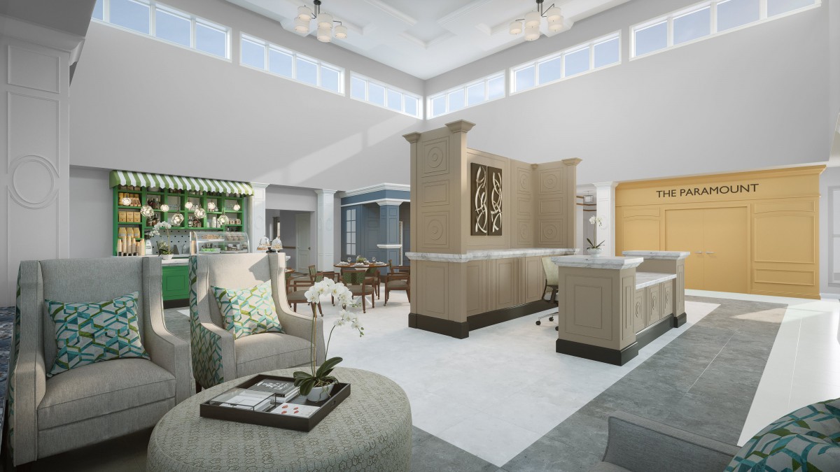 A spacious and modern living room with elegant furnishings and ample natural light.