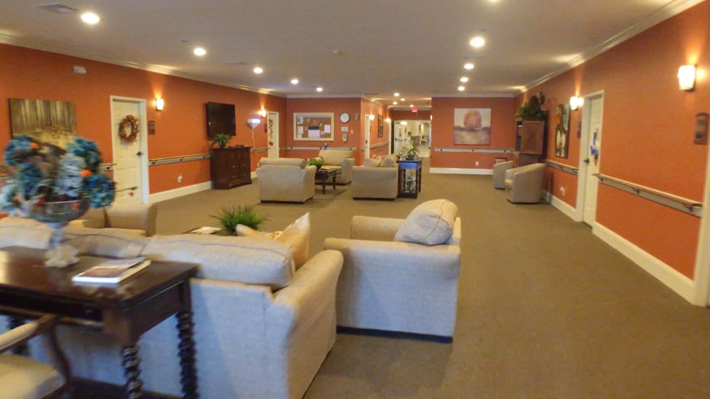 A cozy lobby with comfortable seating and warm decor.