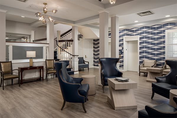 A modern and elegant hotel lobby with comfortable seating and stylish decor.