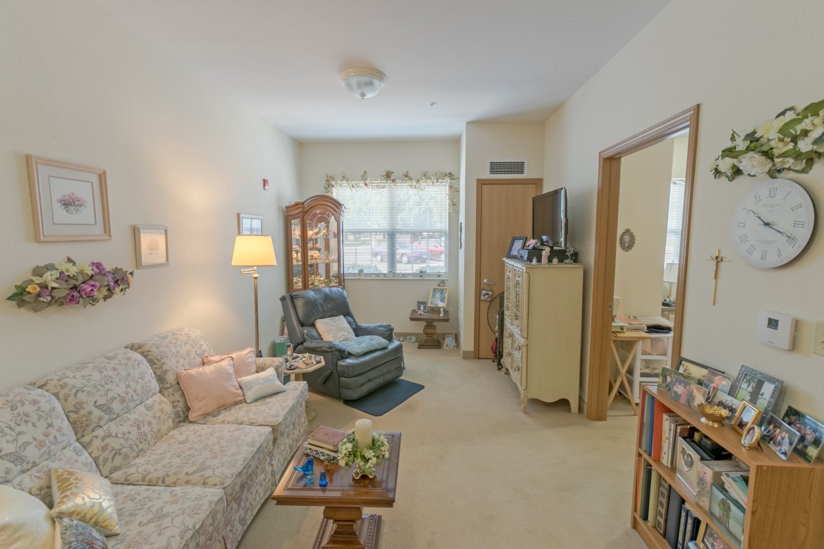 A cozy living room with comfortable furniture and soft lighting.