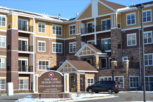 A senior living community featuring modern architecture and snowy surroundings.