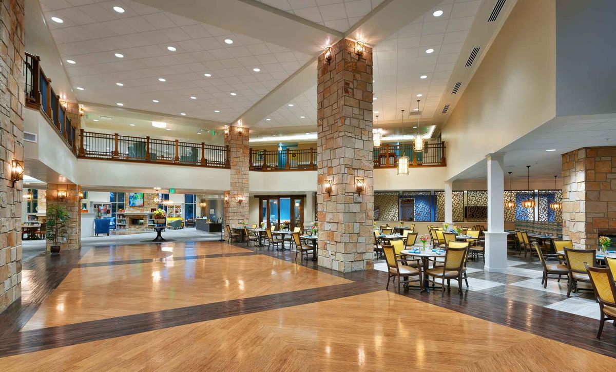 A spacious and modern lobby area with stylish furniture and elegant lighting.