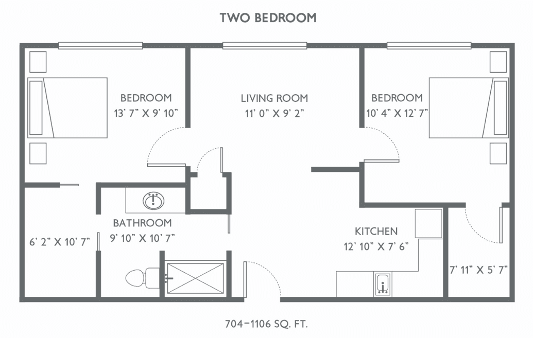 Two-bedroom apartment floor plan with dimensions for each room.
