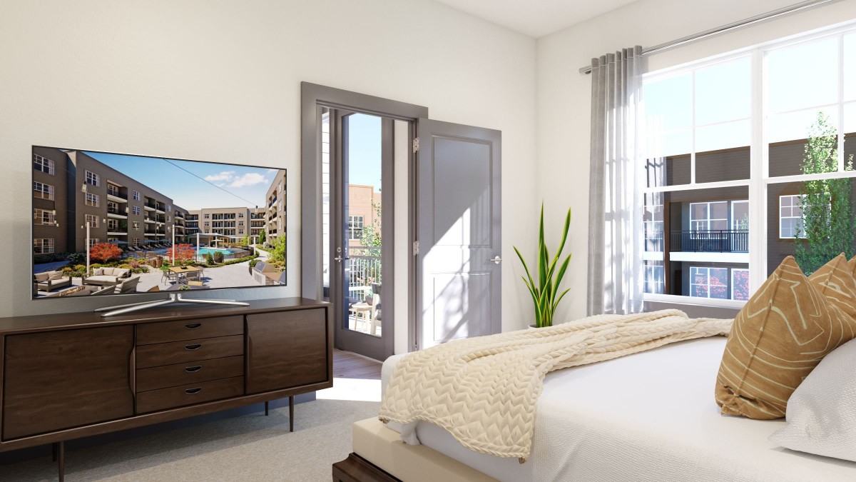 A modern, minimalist bedroom with a TV, dresser, and a plant next to a balcony.