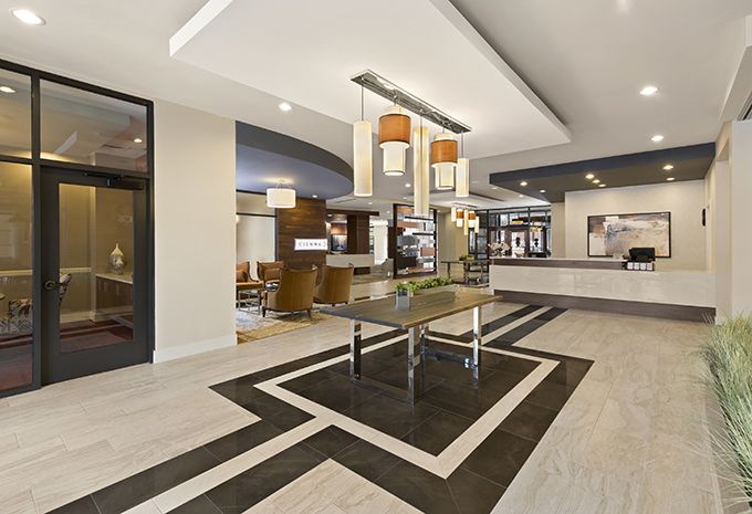 A spacious, modern lobby with sleek furniture and contemporary decor.