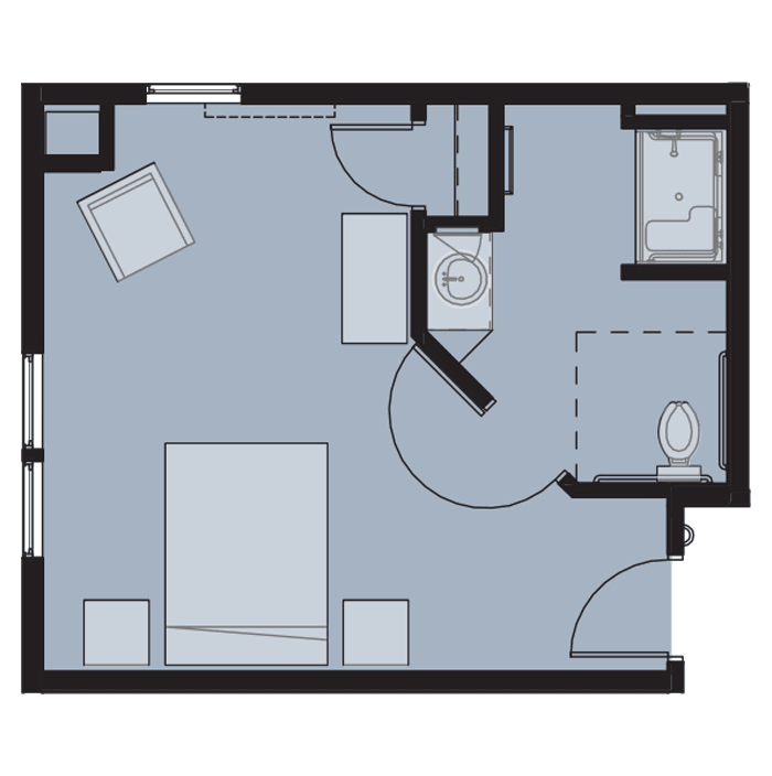 A compact floor plan layout featuring a combined living and sleeping area with a bathroom.