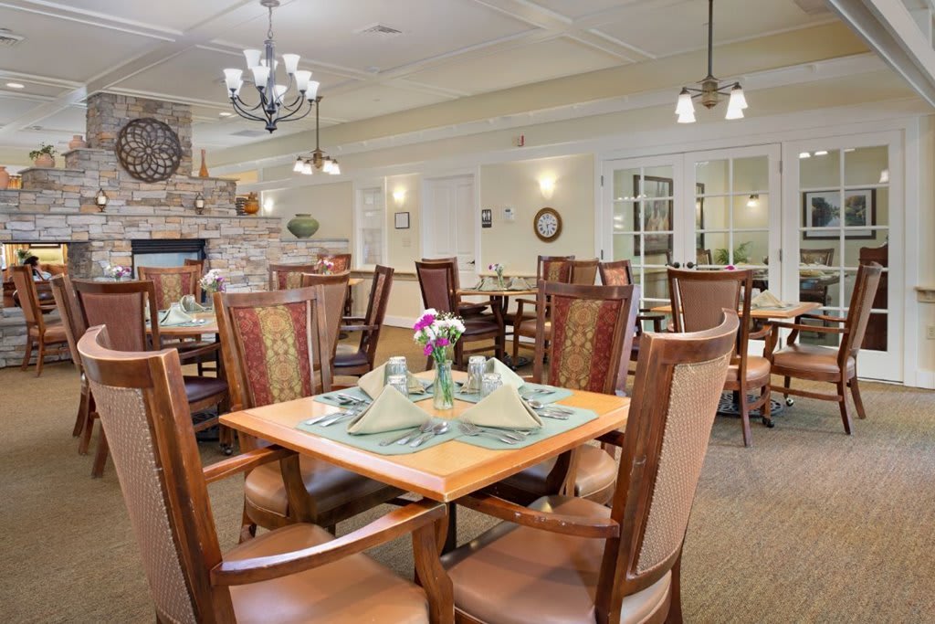 Elegant dining area with neatly arranged tables and classic decor.