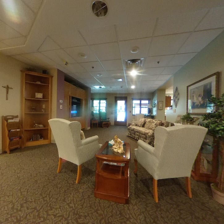 A cozy living room with comfortable seating and warm decor.