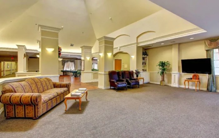 A spacious lobby area with comfortable seating and elegant decor.
