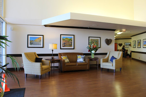 A welcoming lobby area featuring comfortable seating and decorative artwork.